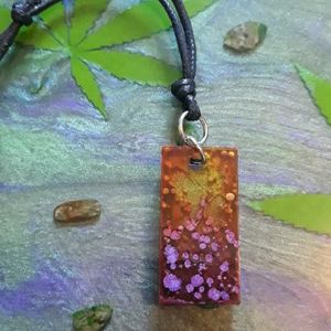 Purple & green resin pendant